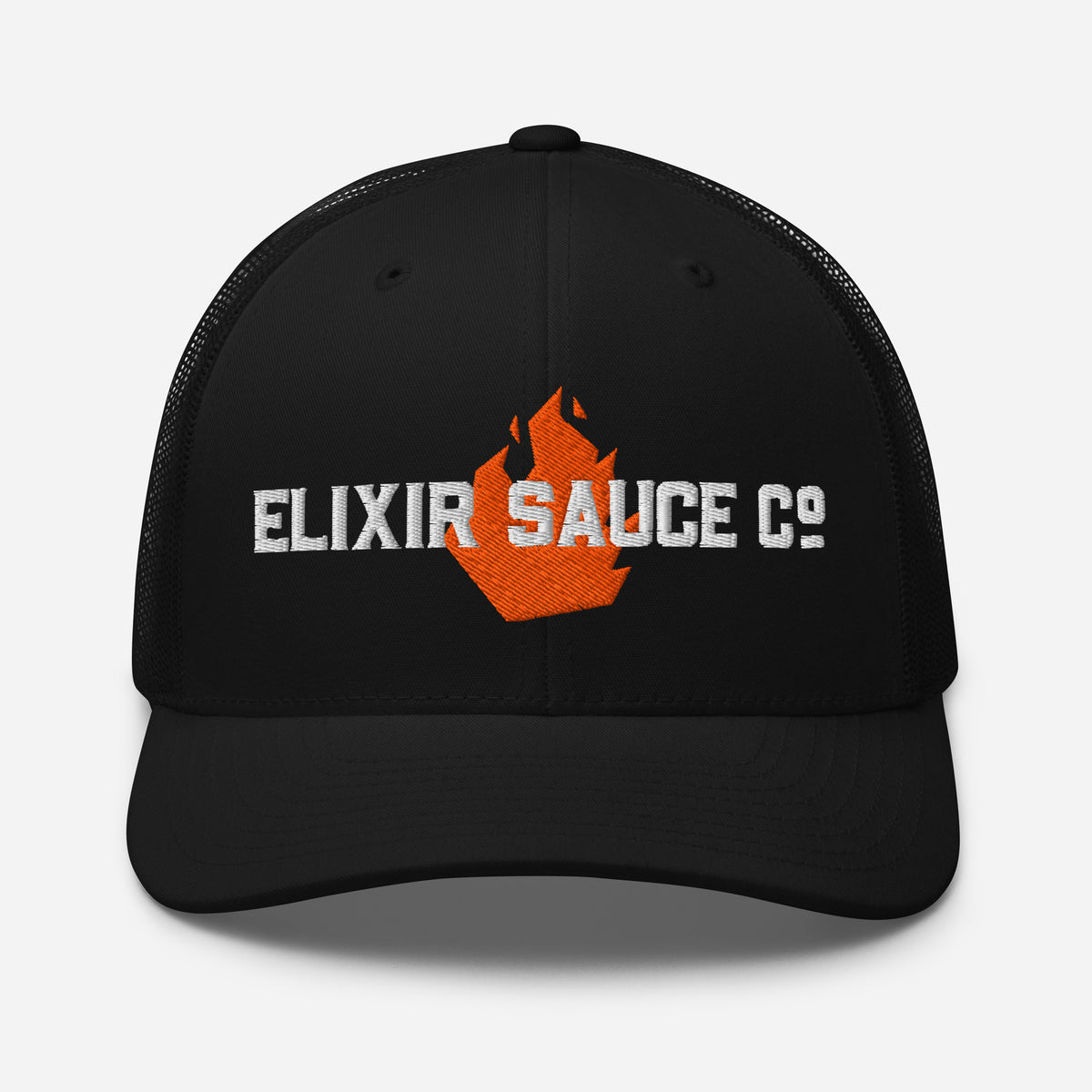 Elixir Sauce Co trucker hat in Black with embroidered flame logo, front view