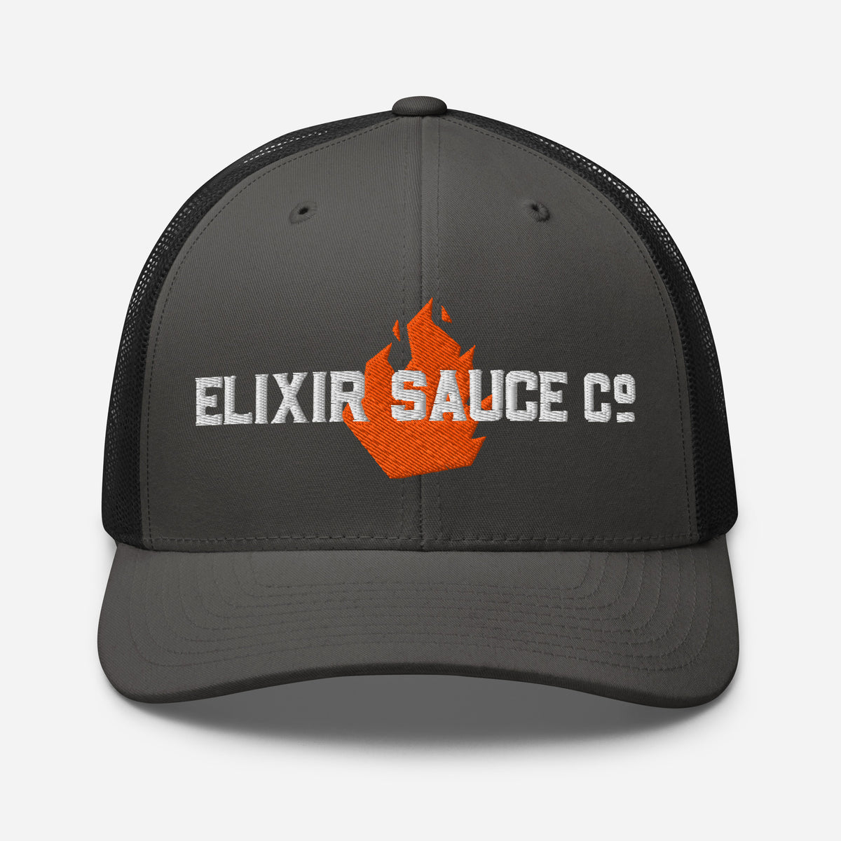 Elixir Sauce Co trucker hat in Charcoal and Black with embroidered flame logo, front view