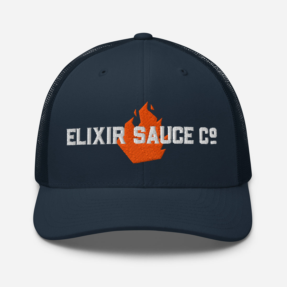 Elixir Sauce Co trucker hat in Navy with embroidered flame logo, front view