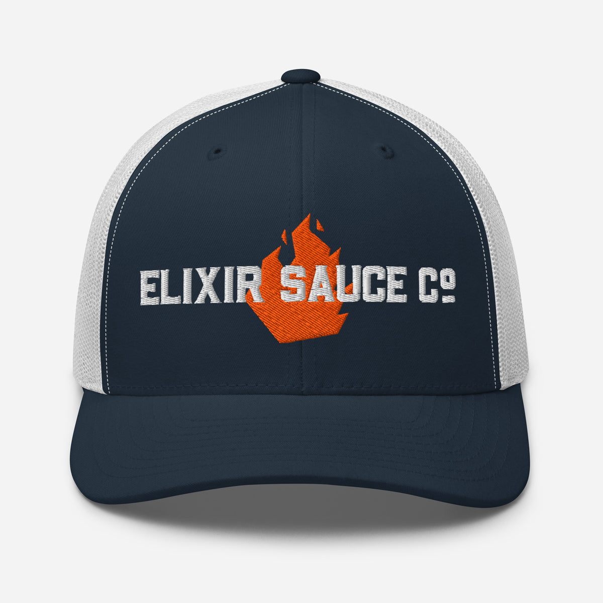Elixir Sauce Co trucker hat in Navy and White with embroidered flame logo, front view